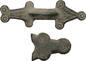obverse: Two broochs with stylized animal patterns.  Roman, 2nd century BC - 2nd century AD   Bronze, 54 x 17 mm and 25 x 18 mm