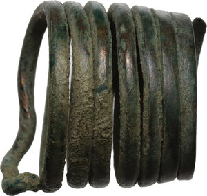 obverse: Bronze spiral ring.  Inner diameter 15 mm, height 18 mm.  Hallstatt period 1200-1000 BC