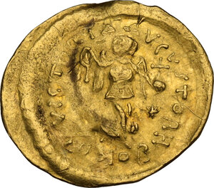 reverse: Justinian I (527-565).. AV Tremissis, Constantinople mint