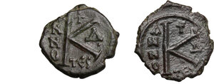 reverse: Justin II (565-578).. Multiple lot of two (2) Halves Folles (one of which with significant traces of overstriking) Thessalonica mint