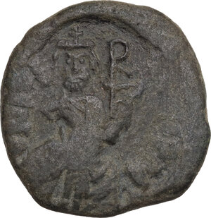 obverse: Heraclius (610-641).. AE Follis, overstruck on a Follis of Justin I for Constantinople. Syracuse mint, 615/6-627/8