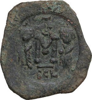 reverse: Constans II, with Constantine IV, Heraclius, and Tiberius (641-668). . AE Follis, Syracuse mint, 659-668 AD