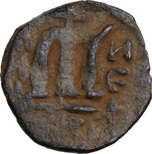 reverse: Umayyad Caliphate. Arab-Byzantine coinage (Pseudo-Byzantine type). . AE Fals, circa 660s