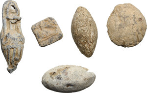 obverse: Leads from Ancient World. Greek Italy. Multiple lot of five (5) lead objects: A Sardo-Punic lead weight, g. 20.56, with mark of value, a votive lead scallop-shell, g. 21.82, a votive lead amphora, g. 25.00, two (2) lead sling shot bullets