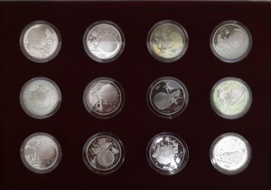 obverse: Isole Marshall. Confezione di 12 monete da 50 Dollari 1994. Ag 999. 