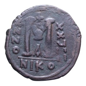 reverse: GIUSTINIANO I (527-565) FOLLIS  ANNO XXYII NIKO CU 16,12 GR. BB+
