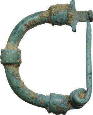 reverse: Bronze fibula.  Roman period, 1st - 2nd century AD.  20 x 16 mm