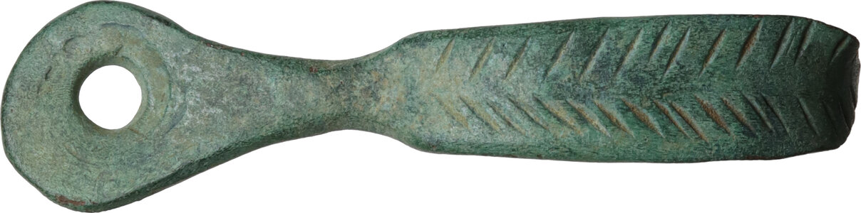 obverse: Bronze miniature strigil decorated with geometric pattern.  Beautiful green patina.  Roman period, 1st - 3rd century AD.  49 mm