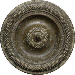 obverse: Large bronze applique with geometric decorations.  Roman period, 1st-3rd century AD.  Diameter 65 mm