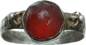 obverse: AR ring with garnet.  Medieval period.  Inner diameter 17 mm