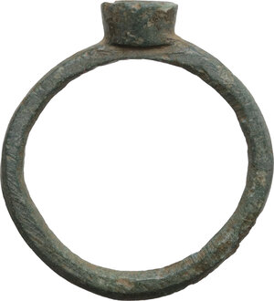 reverse: AE Ring with small seal depicting a highly stylized figure.  Middle Ages.  Inner diameter: 18 mm