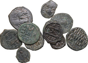 obverse: The Byzantine Empire. Lot of 10 unclassified AE denominations, including: Justin II with Sophia and Anonymous Folles
