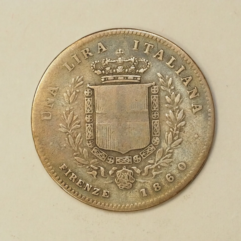 reverse: PREUNITARIE - VITT.EM.II - RE ELETTO - 1859/1861 - 1 lira argento 1860 Firenze ( senza scettro ) correlato da cartellino e bustina artigianali anni  60