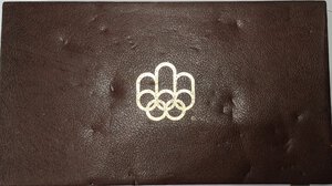 obverse: Canada. Cofanetto con 10 e 5 Dollari. Olimpiadi 1976. Ag 925. 28 Pezzi.