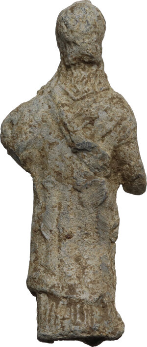 reverse: Lead female votive figure.  Greek.   43 mm