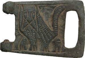obverse: Bronze belt fastening with an engraving of an animal (fox or wolf).Medieval.36x25 mm