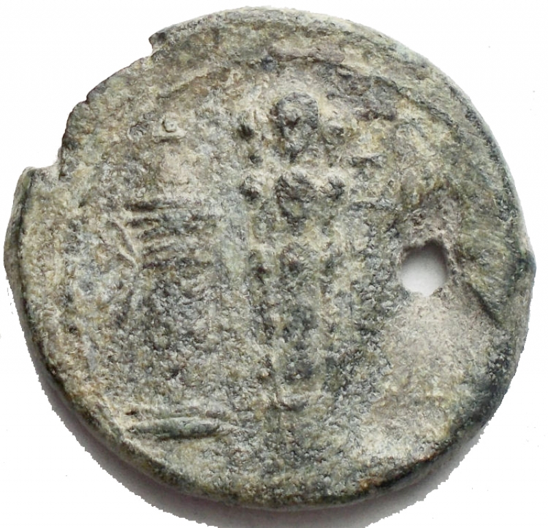 reverse: Apulia, Luceria. Quadrunx, circa 225-217 BC. Obv. Head of Hercules right; behind four pellets. Rev. Quiver, club and bow; HN Italy 679. SNG ANS 704. AE. g 9,5. mm 24,2 x 25,1