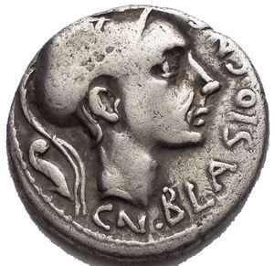 obverse: Cn. Blasio Cn. F. AR Denarius (18,68 mm. 3,81 g) 112/111 BC. Obv. Helmteted head of Mars right; behind, prow-stem; before, CN·BLASIO·CN·F.Rev. Iupiter standing facing between Juno and Minerva and holding sceptre in right hand and thunderbolt in left hand; Juno holds sceptre in right hand; Minerva holds sceptre in left hand and crowns Iupiter with right hand; in exergue, ROMA.Crawford 296/1d. VF