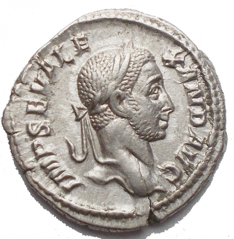 obverse: Roman Imperial Severus Alexander AD 222-235. Rome Denarius AR 20 mm, 3,85 g IMP SEV ALEXAND AVG, laureate head right / VIRTVS AVG, Severus Alexander, laureate and in the guise of Romulus, walking right, holding spear in his right hand and trophy over his left shoulder. EF/VF Particular style and beautiful portrait BMC 522; Cohen 584; RIC 224.
