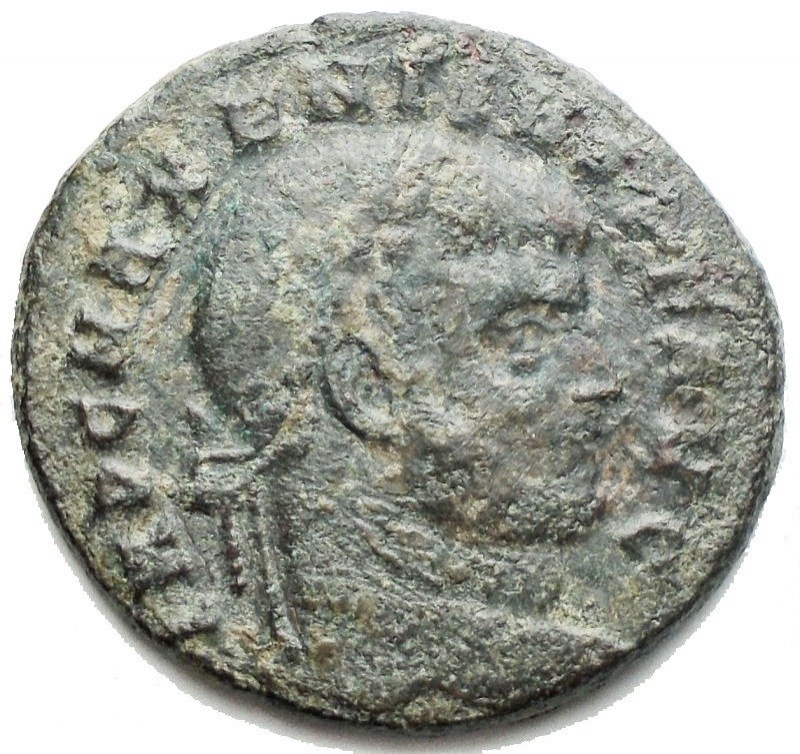 obverse: Roman Empire - Maxentius. 306-312 A.D. : Follis. D / IMP MAXENTIVS PF AVG Head of Maxentius to the right. R \ VICTORIA AETERNA AVG N Victory to the right with branch and patera. Ostia Mint. Ric. 54. Weight 5.75 gr. Diameter 18.7 mm. Green Patina
