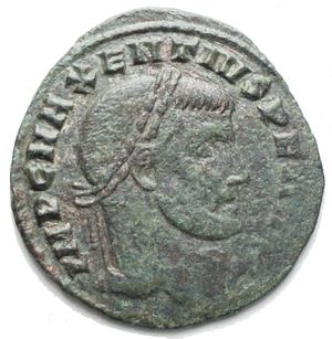 reverse: Maxentius. AD 307-312. Æ Follis (24,5 x 25,6 mm. 4,3 g). Ostia mint. Struck AD 309-312. Laureate head right / She-wolf standing left, suckling twins Remus and Romulus. Rare. Green patina