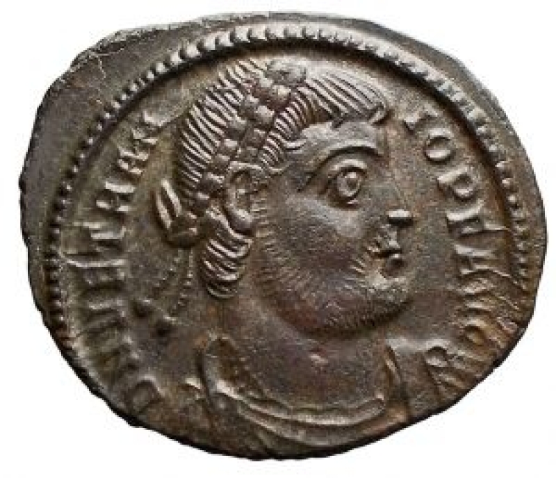obverse: Vetranio (AD 350). Æ Maiorina (5.4 g, 25.6 mm). Thessalonica 1st offcina. Obv: DN VETRANIO PF AVG. Bust draped and armored to ds with graduated head right. Rev: CONCORDIA MILITVM. The Emperor standing standing face to left with two banners with inscription CHI RO; the sides A-B; in exergue, • TSA •. Ref: RIC 132. Good example
