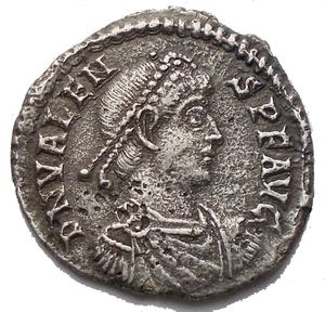 reverse: VALENS (364-378). Siliqua. Aquileia. Obv: D N VALENS P F AVG. Diademed, draped and cuirassed bust right. Rev: VOTIS / X / MVLTIS / XX / AQPS•. Legend in 4 lines within wreath. RIC 14a. Condition: VF-GoodVF+. Weight: 2,1 g. Diameter: 18 mm.