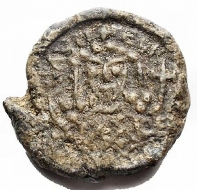 obverse: Lead Seal. c.a. 7th-8th century AD. Obv. Crowned facing bust, wearing consular robes, holding cross. Rev. Cruciform monogram. 16.87 g. 24.4 x 22.6 mm.