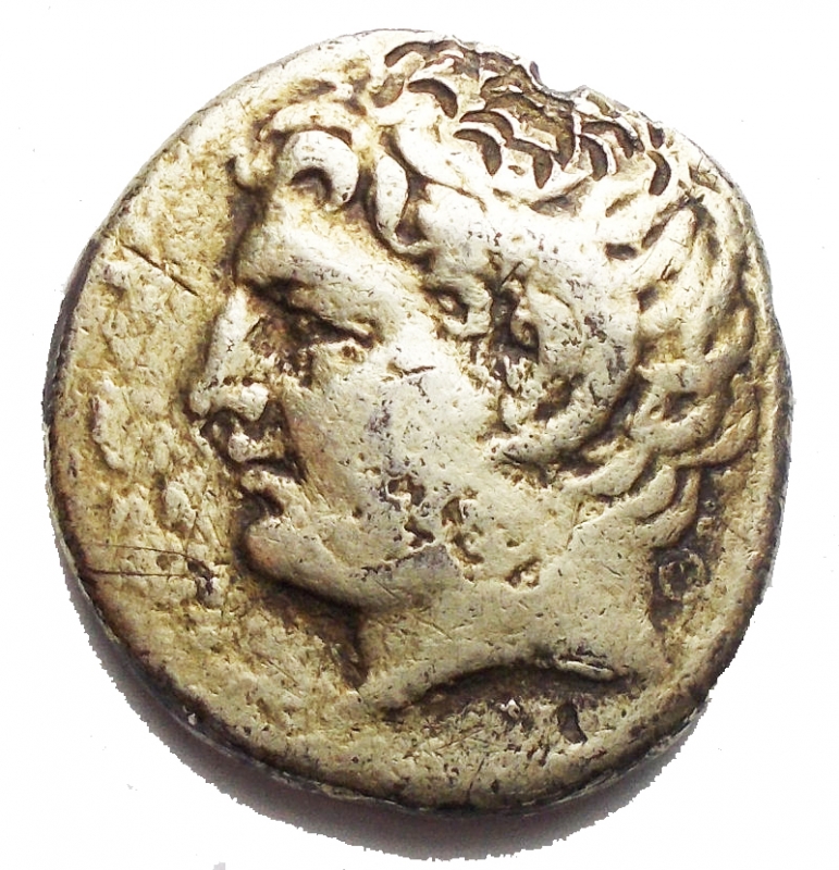 obverse: Ancient Greece CYRENAICA. Cyrene. Didrachm 308-277 BC Fourre, with gilding ??? A / Head of Apollo Carneios on the left. R / Silphium plant with symbols, monograms and KY-PA. 7.11 g. 12.35 x 13.85 mm