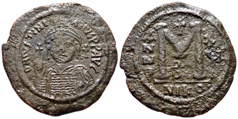 obverse: Giustinianus I (527 - 565). Costantinopoli. AE Follis [40 Nummi], (20,43 gr. - 43 mm.). D.\: D N IVSTINIANVS P P AVG. R.\: M -  A/N/N/O XIII - B / NIKO. Sear 201. BB++. Flan davvero notevole  e stupendo: 43 mm.! 