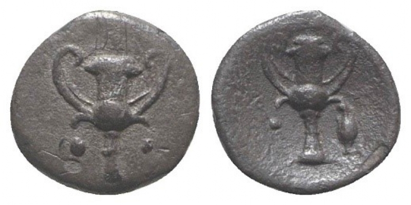 obverse: Apulia, Tarentum (280-228 a.C.). AR Obolo (9mm - 0.41g.). D.\: Kantharos, due stelle; R.\: Kantharos. Vlasto 1651; HNItaly 1076. BB. R1.