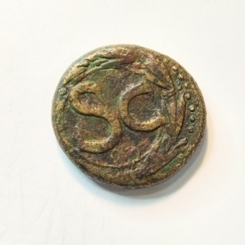 reverse: Claudio (41-54). Seleucis e Pieria, Antiochia. AE Bronzo (24 mm – 15,3 gr.). R.\: SC in corona d’alloro. MB. NC. Note: moneta molto spessa.