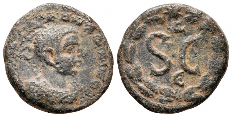 obverse: Diadumeniano (218). Seleucis e Pieria, Antiochia. AE Bronzo (18 mm - 4,54 gr.). R.\: SC in corona d’alloro, € nel campo. MB. R2.