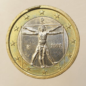 obverse: CURIOSITÀ – 1 EURO ITALIA 2002 ESUBERO DI METALLO AL BORDO