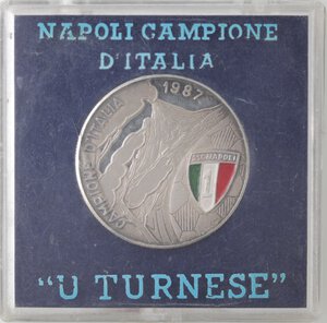 obverse: Medaglia. Emissione Privata. Campionato Nazionale di Calcio 1987. Napoli Campione d Italia. Ag. Smalti. Titolo 925. 