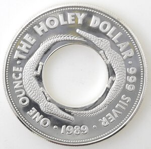 reverse: Australia. Dollaro 1989. Ag. Holey Dollar. 