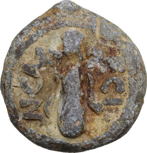 reverse: Leads from Ancient World. PB Object, with obverse features of Republican AE Quadrans. On reverse: N.CAL/ ECI