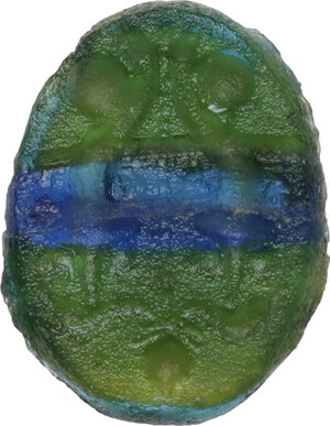 obverse: Glass paste decorated with two cornucopiae.  Roman period, 1st-3rd century AD.  12 mm