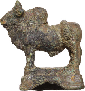 obverse: Solid bronze zebu figure standing on a shallow plinth.  Roman imperial, 1st-3rd century AD.  25 x 34 mm. 27.63 g