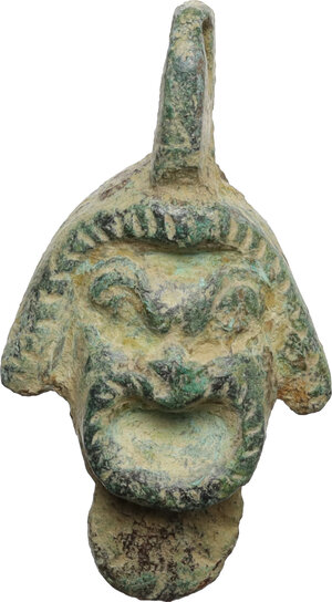 obverse: Bronze pendant in the shape of a theater mask.  Roman period.  40 mm with the original loop