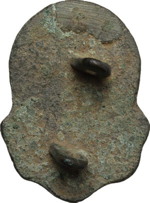 reverse: Bronze decorative element in the shape of helmeted head.  Late roman period or migration period.  37 x 27 mm
