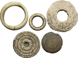 obverse: Lot of 5 bone gaming pieces.  Roman period, 1st-4th century AD.  From 32 mm to 17 mm
