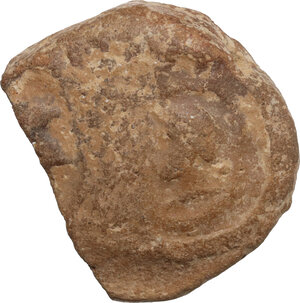 obverse: Terracotta seal depicting a female (?) head left.  Greek or Roman