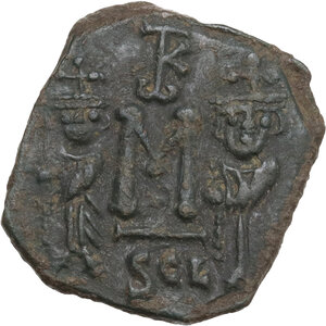 reverse: Constans II, with Constantine IV, Heraclius, and Tiberius (641-668). . AE Follis, Syracuse mint, 659-668. Obv