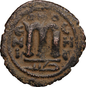 reverse: The Umayyad Caliphate.  Arab-byzantine, pre-reform coinage. AE Fals, Emesa mint, 41-77 H / 661-697 AD