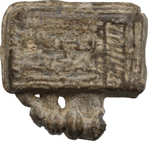 reverse: Islamic (c. 10th or 11th century AD). Amulet lead case. Small box (21.5 x 20.4mm) with a suspension loop on the top and a flap opened on the right to contain in its interior a folded talismanic scroll