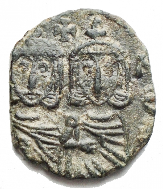 obverse: Impero Bizantino - Costantino V (741-775). Follis, Siracusa. D/ Costantino V e Leone IV. In alto, una croce. R/Leone III  g 2,95. AE. BB-qSPL Patina verde.