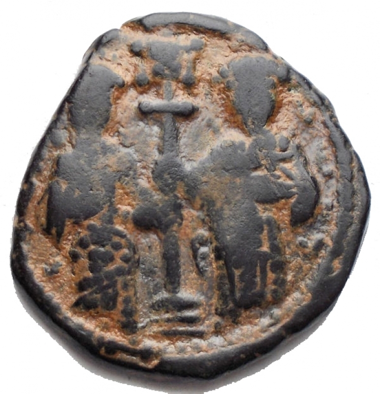 obverse: Impero Bizantino - Constantine X. Follis. AE. D / EMMANOVHA Front Christ. R / Eudocia and Costantino hold a scepter with cross and banner. Sear 1853. Weight 9.18 gr. Diameter 25.3 x 27.3 mm. VF