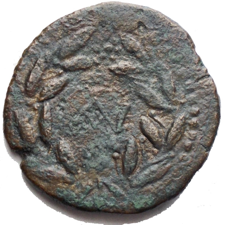 obverse: Mondo Greco - SICILY, Uncertain Roman mint. Circa 200-190 BC. Æ As (21.9 mm. 6,3 g). Laureate head of bearded Janus; I (mark of value) above / Monogram within wreath. BAR Issue 37; CNS 71 (Panormus); HGC 2, 1690. aVF
