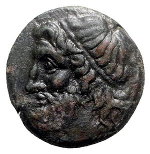 obverse: Sicily, Syracuse. Hieron II (275-215 BC). Æ (19.5mm, 5.82g, 9h). Head of Poseidon l., wearing tainia. R/ Ornamented trident head flanked by two dolphins. CNS II, 197; SNG ANS 964ff.; HGC 2, 1550. VF